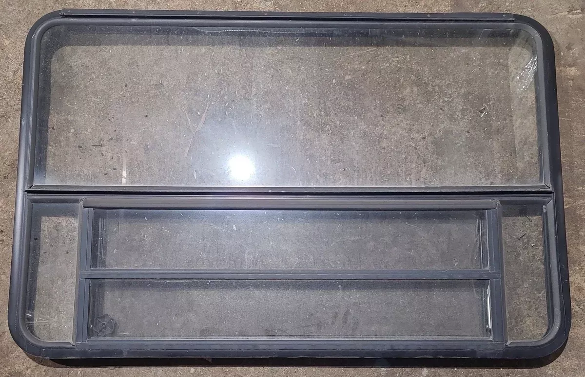 Used Black Radius Emergency Opening Window : 53 1/2" W x 34 3/4" H x 1 1/4" D